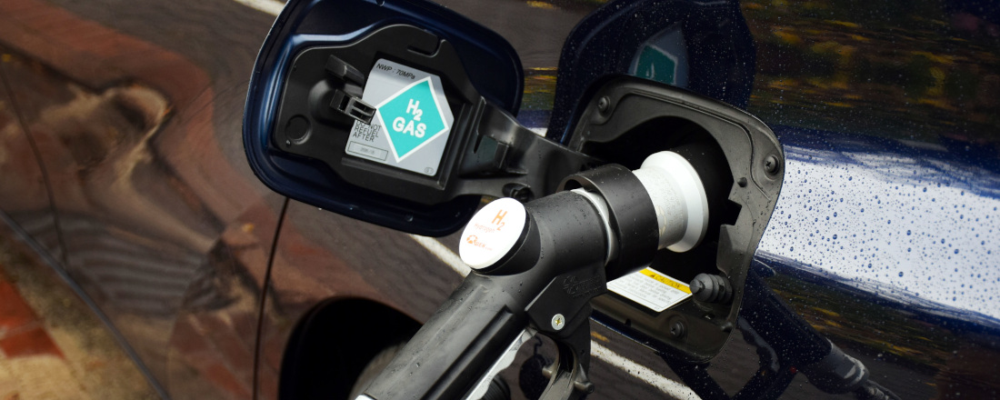 A car tank is filled with hydrogen at an H2 filling station